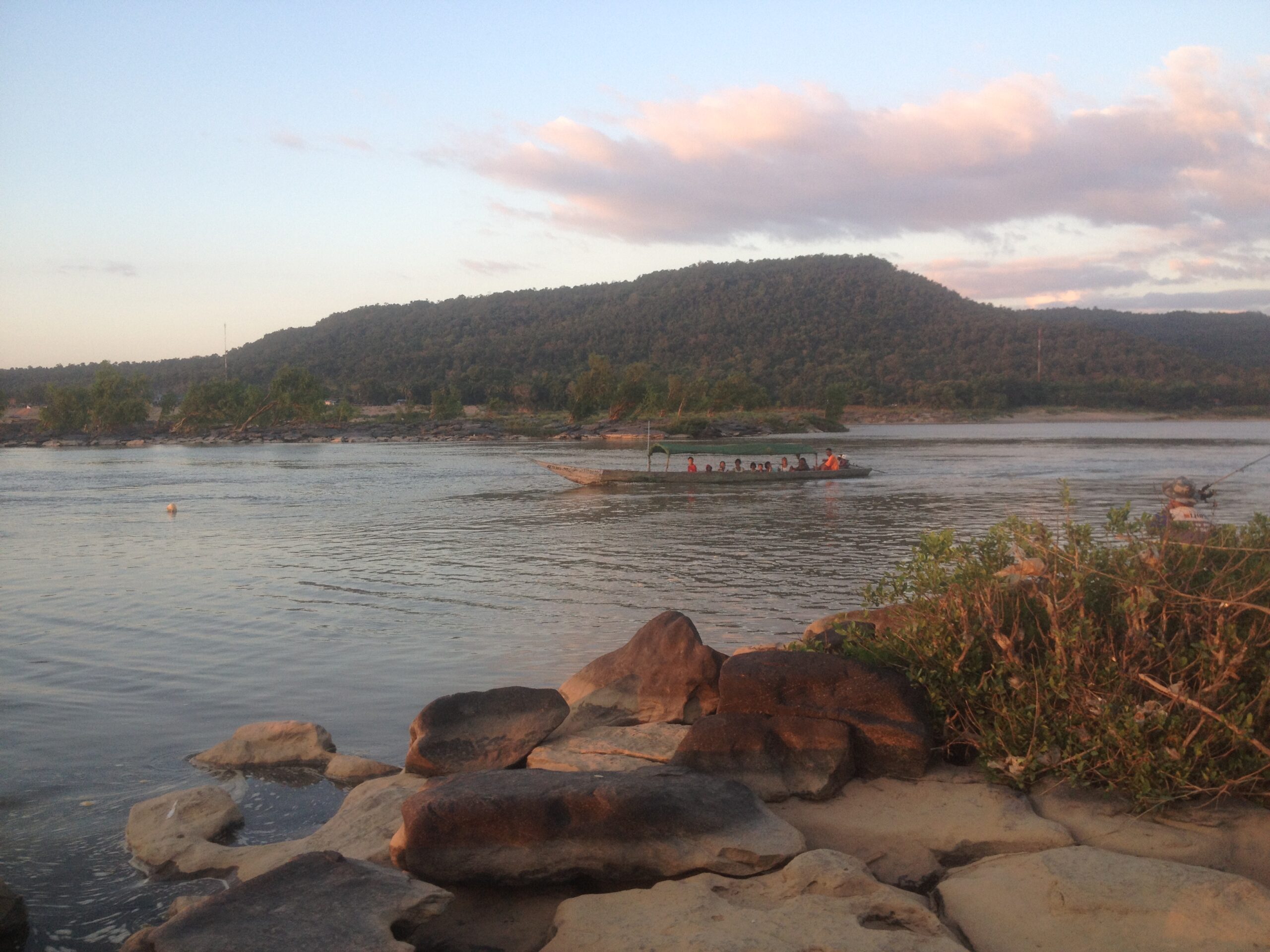  sun set at the confluence of the chocolate-brown Mekong and the deep blue Mun rivers