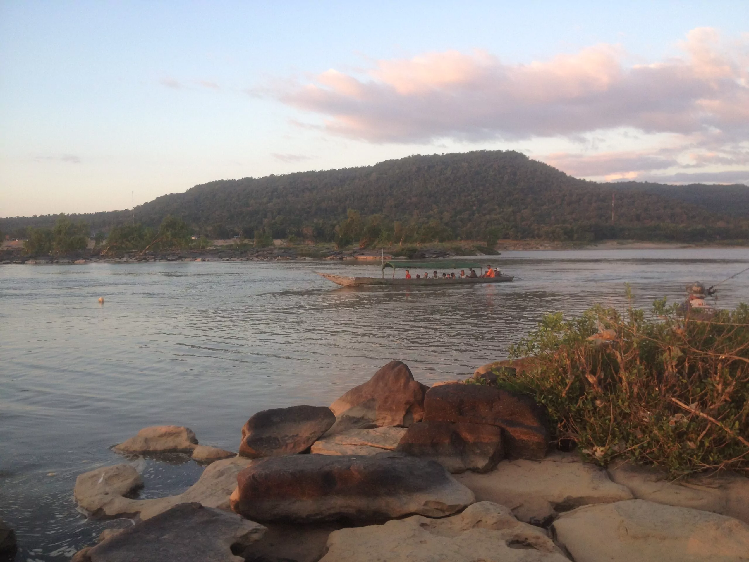  sun set at the confluence of the chocolate-brown Mekong and the deep blue Mun rivers